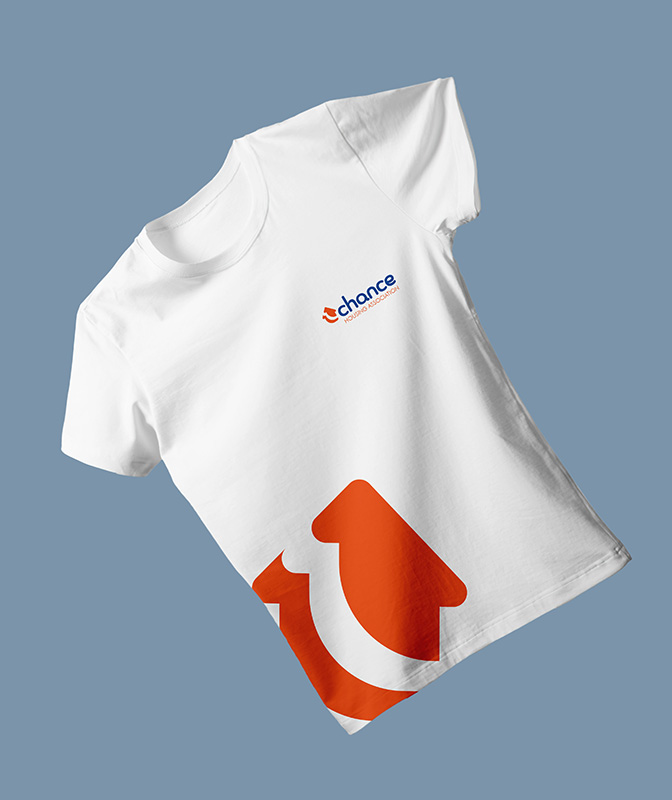 Brand Identity - Merchandise - Graphic Design - Mockup of T-Shirt front with logo printed on it.